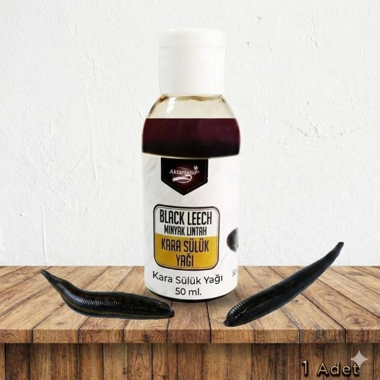  Kara Sülük Yağı şişesi ve cinsel performansı simgeleyen doğal elementler