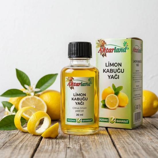 Doğal limon kabuğu yağı şişesi ve taze limonlar